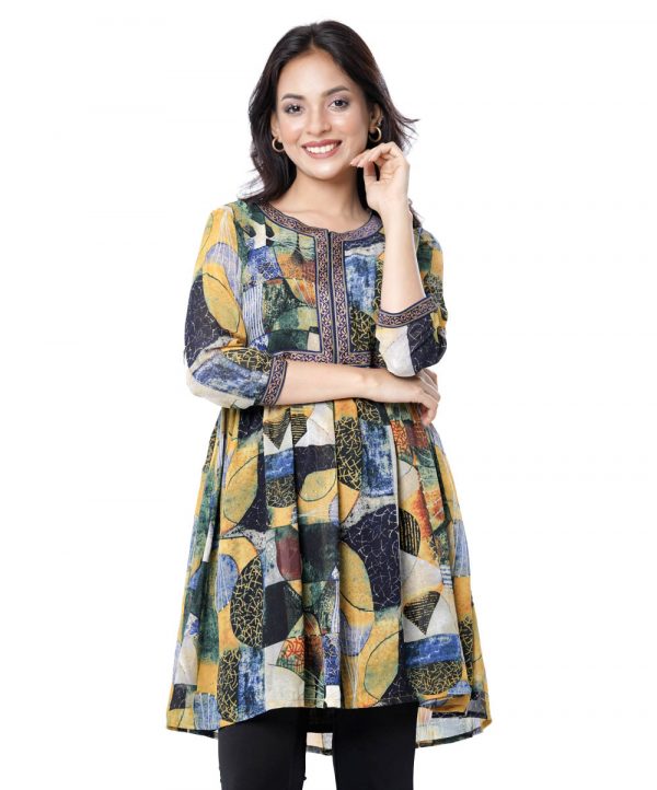 Multi-color A-line Tunic in printed Georgette fabric. Designed with a round neck and three-quarter sleeves. Embellished with printed patch attachment at the top front and cuffs. Pleats from the waistline.