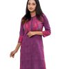 Purple all-over printed straight-cut Kameez in Georgette fabric. Features a band neck with button opening at the front and three-quarter sleeves. Embellished with embroidery at the top front. Printed patch attachment at the side slits. Unlined.