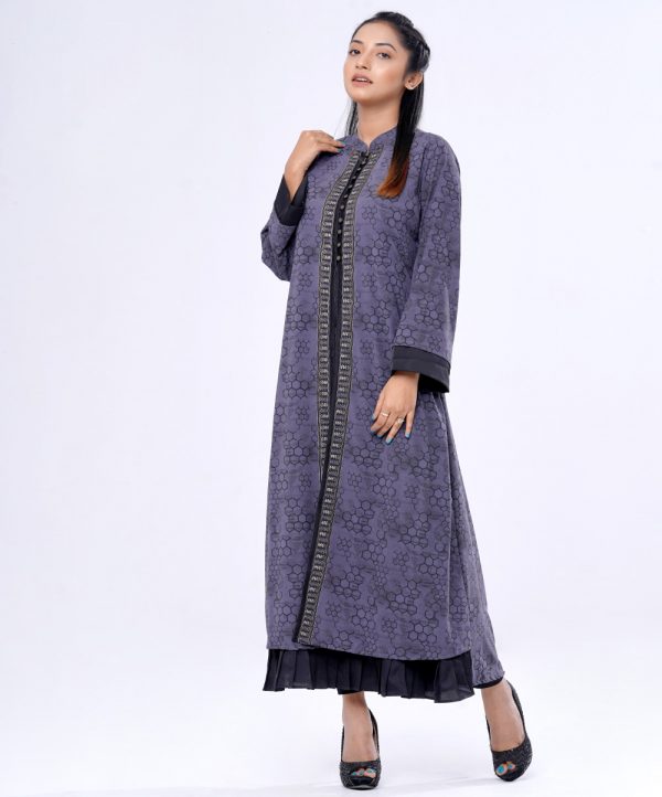 Gray & Black shrug style Abaya in Georgette fabric and inner in Crepe fabric. Designed with a mandarin collar and full sleeves. Embellished with embroidery and metal buttons at the front. Spliced gather hemline.