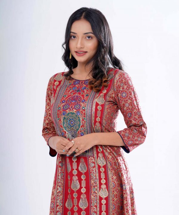 Maroon all-over printed A-line Woven Top in Viscose fabric. Designed with a round neck and three-quarter sleeves. Embellished with karchupi at the top front. Single button opening at the back.