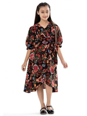 Black retro-wrap style frock in printed Georgette fabric. Designed with a V-neck and puff sleeves. Extended waving ruffle at the front.