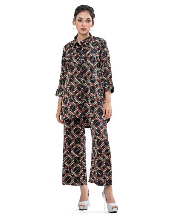 Black Shirt with bottom in printed Georgette fabric. The shirt is designed with a classic collar with button opening at the front and roll-up sleeves. Paired with a printed georgette palazzo pants as the bottom.