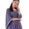 Gray all-over printed kaftan style Tunic in Georgette fabric. Designed with a round neck and three-quarter sleeves. Embellished with embroidery at the top front. Tasseled tie-cord closing at the front.
