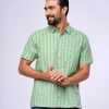 Green all-over printed casual Shirt in slab Cotton fabric. Designed with a classic collar and short sleeves.