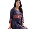 Navy blue all-over printed Kameez in Crepe fabric. Designed with a V-neck and three-quarter sleeves. Embellished with printed patches at the front and pleats from the waistline. Tasseled tie-cord closing at the one side.