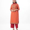 Orange and Red all-over printed Salwar Kameez in Viscose fabric. The Kameez is designed with a round neck and three-quarter sleeves. Embellished with karchupi at the front. Complemented by palazzo pants and a chiffon dupatta.