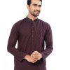 Maroon fitted Panjabi in Jacquard Cotton fabric. Designed with a mandarin collar and matching metal button on the placket.