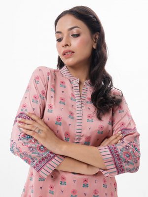 Pink all-over printed straight-cut Kameez in Crepe fabric. Features a band collar with hook closure at the front and three-quarter sleeves. Embellished with embroidery at the front and cuffs. Unlined.