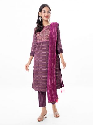 Purple all-over printed Salwar Kameez in Crepe fabric. The Kameez is designed with a round neck and three-quarter sleeves. Embellished with embroidery at the top front and wave tucks at the cuffs. Complemented by all-over printed culottes pants and a half-silk dupatta.