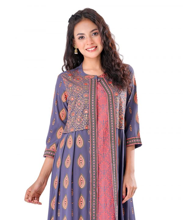 Gray and Salmon pink all-over printed shrug style Tunic in Georgette fabric. Designed with a band neck and three-quarter sleeves. Embellished with embroidery at the front and pleats from the waistline. Unlined.