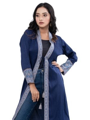Blue long Shrug in Crepe fabric with full sleeves. Embellished with pin tucks at the front.