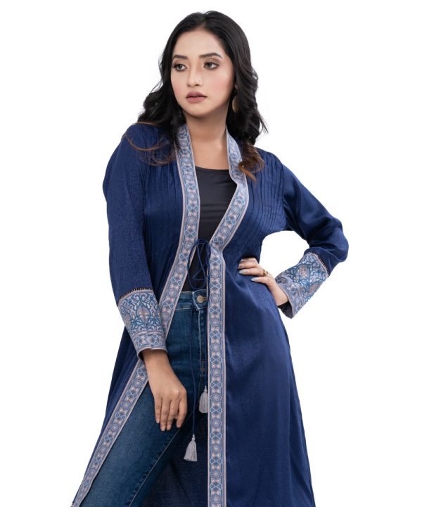 Blue long Shrug in Crepe fabric with full sleeves. Embellished with pin tucks at the front.
