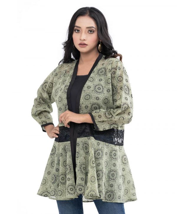 Green Shrug in printed Georgette fabric with bishop sleeves. Detailed with net attachment at the waistline.