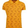 Yellow all-over printed Polo in Cotton Pique fabric. Designed with a classic collar, and short sleeves.