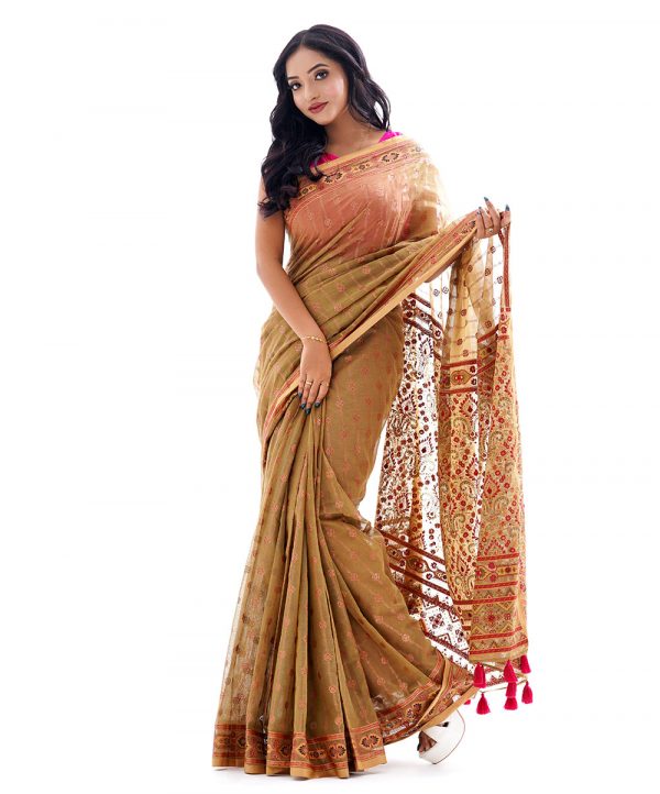 Olive Green all-over printed Saree in Cotton fabric. Embellished with karchupi, and decorative tassels on the achal.
