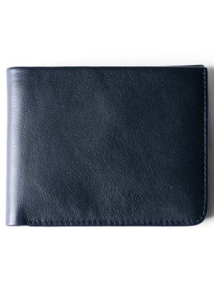 Black genuine leather wallet. Features multiple chambers to keep essentials.
