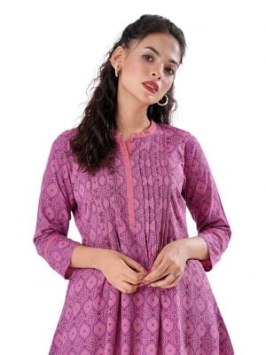 Pink all-over printed A-line Woven Top in Viscose fabric. Designed with a band neck and three-quarter sleeves. Embellished with pin tucks at the top front.