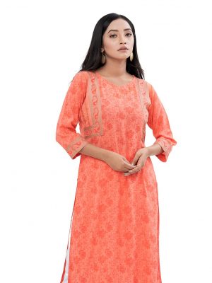 Orange all-over printed Straight-cut Kameez in Georgette fabric. Features a V-neck and three-quarter sleeves. Embellished with karchupi at the top front.