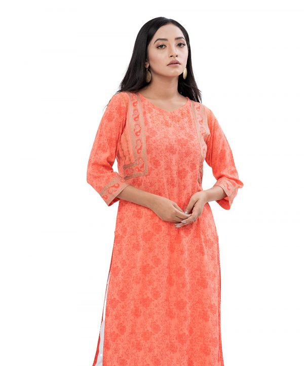 Orange all-over printed Straight-cut Kameez in Georgette fabric. Features a V-neck and three-quarter sleeves. Embellished with karchupi at the top front.