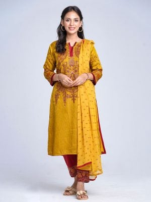 Mustard all-over printed Salwar Kameez in textured Silk-blend and crepe fabric. The Kameez is designed with a round neck and three-quarter sleeves. Embellished with embroidery and karchupi at the front cuffs. Viscose lining in full body. Complemented by crepe culottes pants with printed border and printed chiffon dupatta.