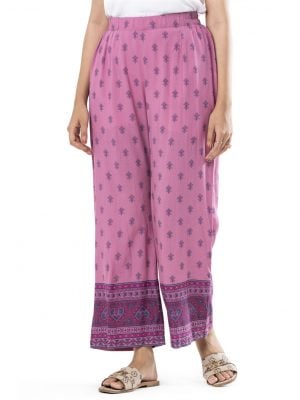 Onion Pink all-over printed Palazzo in Viscose fabric. Concealed elastication on the waistline.