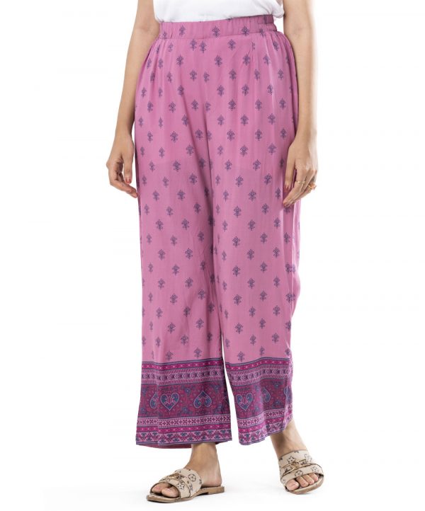 Onion Pink all-over printed Palazzo in Viscose fabric. Concealed elastication on the waistline.