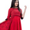 Red all-over printed layered Gown in Georgette fabric. Designed with a round neck and three-quarter sleeves with buttoned cuffs. Embellished with karchupi at the top front.