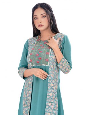 Green all-over printed shrug style Tunic in Georgette fabric. Designed with a round neck and three-quarter sleeves. Embellished with embroidery and pin tucks at the front. Elongated hemline. Unlined.