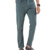 Green slim fitted jeans in cotton spandex denim fabric. Five pockets, button fastening on the front and zipper fly.