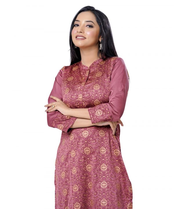 Onion pink all-over printed straight-cut Kameez in Crepe fabric. Features a band neck with hook closure at the front and three-quarter sleeves with printed cuffs. Unlined.