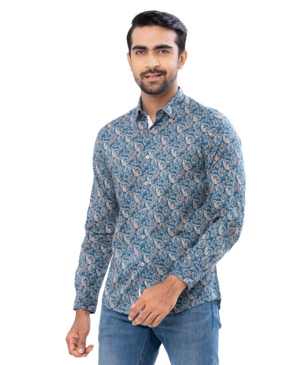 Blue casual shirt in paisley printed Cotton fabric. Designed with a classic collar and long sleeves with adjustable buttons at the cuffs. Slim fit.