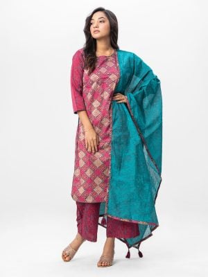 Onion Pink and Teal green all-over printed Salwar Kameez in Crepe fabric. The Kameez is designed with a round neck and three-quarter sleeves. Embellished with karchupi at the top front. Single button opening at the back. Complemented by palazzo pants and a half-silk dupatta with printed borders.