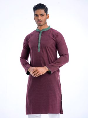 Maroon semi-fitted Panjabi in Jacquard Cotton fabric. Designed with a contrast green collar and hidden button placket.