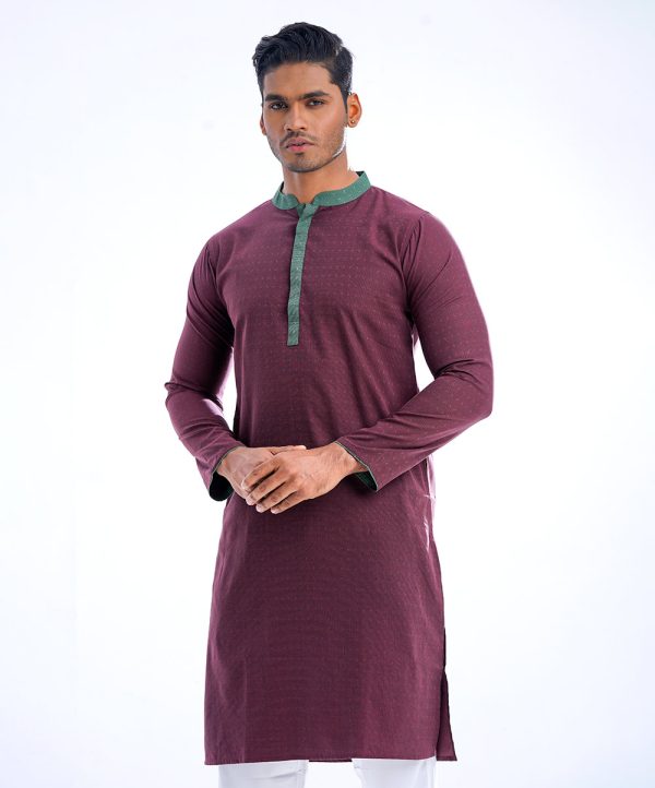 Maroon semi-fitted Panjabi in Jacquard Cotton fabric. Designed with a contrast green collar and hidden button placket.