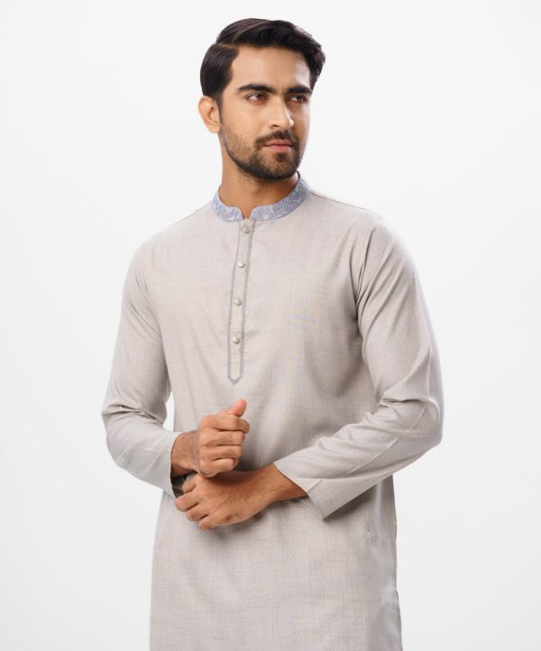 Gray semi-fitted Panjabi in Cotton-blend fabric. Designed with embroidery on the collar and button placket.