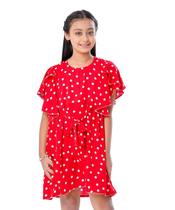 Red Frock in printed Georgette fabric. Designed with a round neck and overlap flounce sleeves. Detailed with tie-waist belts at the front. Gathers on the hemline. Button opening at the back. Viscose lining in half-body.
