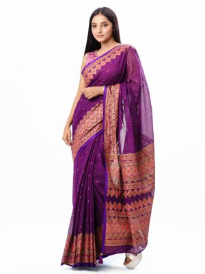 Purple all-over printed Saree in Cotton fabric. Embellished with decorative tassels on the achal.