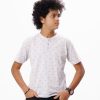 Gray all-over printed Henley T-Shirt in Cotton single jersey fabric. Features a round neck with front button fastening and short sleeves.