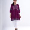 Purple Tunic in printed Georgette fabric. Designed with a round neck and lantern sleeves. Embellished with patch attachment at the top front and gathers from the waistline. Unlined.