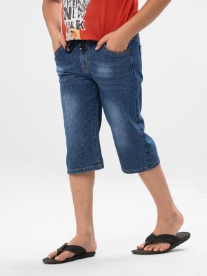 Blue all-over printed three-quarter jeans pants in Denim fabric. Drawstring and covered elastic at waistband. Features front side pockets, back pockets and mock fly zipper fastening at the front.