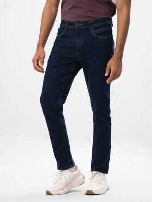 Blue regular-fit jeans in denim fabric. Five pockets with button fastening at the front & zipper fly.