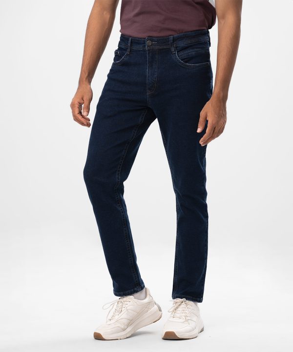 Blue regular-fit jeans in denim fabric. Five pockets with button fastening at the front & zipper fly.