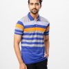 Blue Polo in Cotton single jersey fabric. Designed with a classic collar, and short sleeves. Metal logo attachment on the chest.