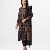 Black all-over printed Salwar Kameez in Viscose fabric. The Kameez features a low mock neck and three-quarter sleeves. Embellished with karchupi at the top front. Complemented by culottes pants and a printed half-silk dupatta.