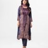 Shrug-style Salwar Kameez in crepe fabric. Boat neck, quarter sleeved, screen printed and scalloped in the bottom. Chiffon dupatta with pant-style pajamas.
