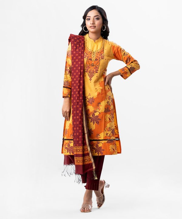 Yellow and Maroon all-over printed Salwar Kameez in Viscose fabric. The Kameez features a band neck and full sleeves. Embellished with karchupi and pin tucks at the front. Complemented by maroon culottes pants and a printed half-silk dupatta.