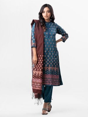 Sea Green all-over printed Salwar Kameez in Crepe fabric. The Kameez features a band neck with hook closure at the front and three-quarter sleeves. Embellished with karchupi at the top front. Complemented by culottes pants and a printed half-silk dupatta.