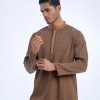 Brown fitted panjabi in Jacquard Cotton fabric. Designed with a mandarin collar and hidden button placket.