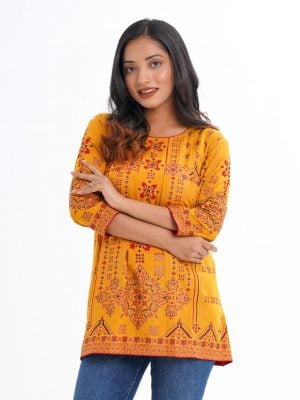 Mustard Yellow all-over printed A-line Tunic in Viscose fabric. Designed with a round neck and three-quarter sleeves. Embellished with karchupi and pin tucks at the front. Single button opening at the back.