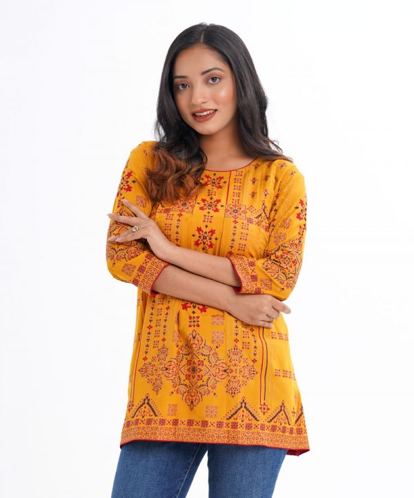 Mustard Yellow all-over printed A-line Tunic in Viscose fabric. Designed with a round neck and three-quarter sleeves. Embellished with karchupi and pin tucks at the front. Single button opening at the back.